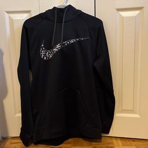 Black Nike hoodie with camo pattern swish